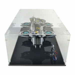 a toy model of a space ship in a glass case